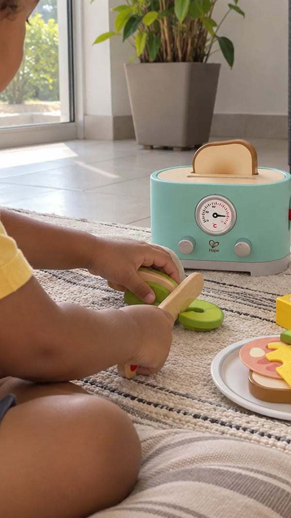 Cliente com a Torradeira Ding e Pop-Up Hape 5
